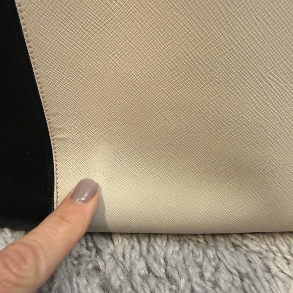 Prada Black and Cream Satchel
Saffiano Leather
Beautiful Handbag - Picture 9 of 12